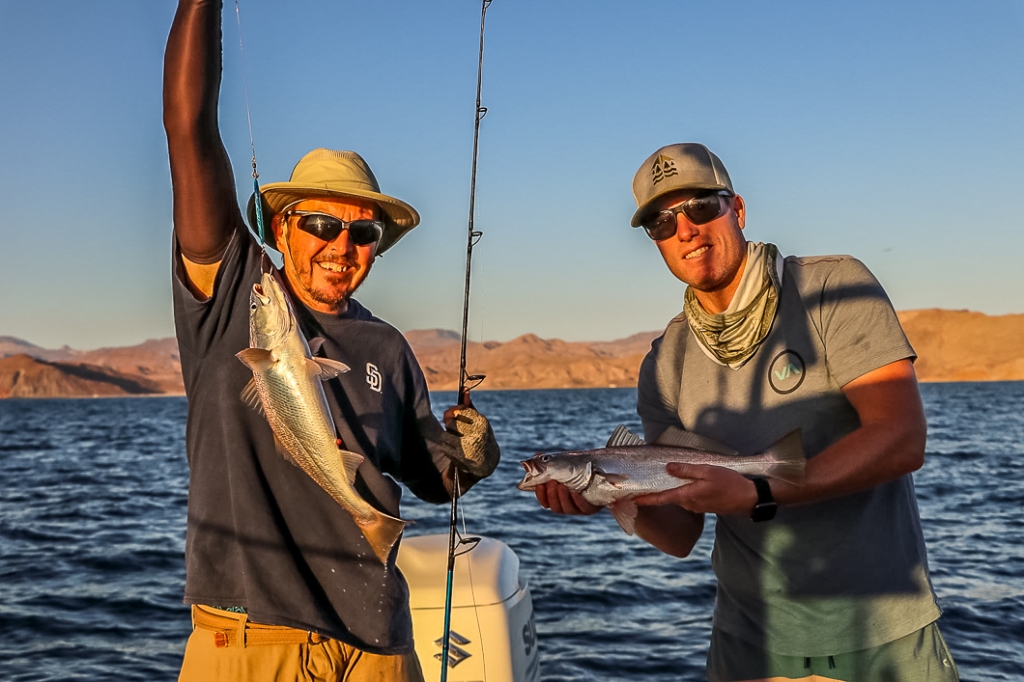 Anglers with fresh caught corvina