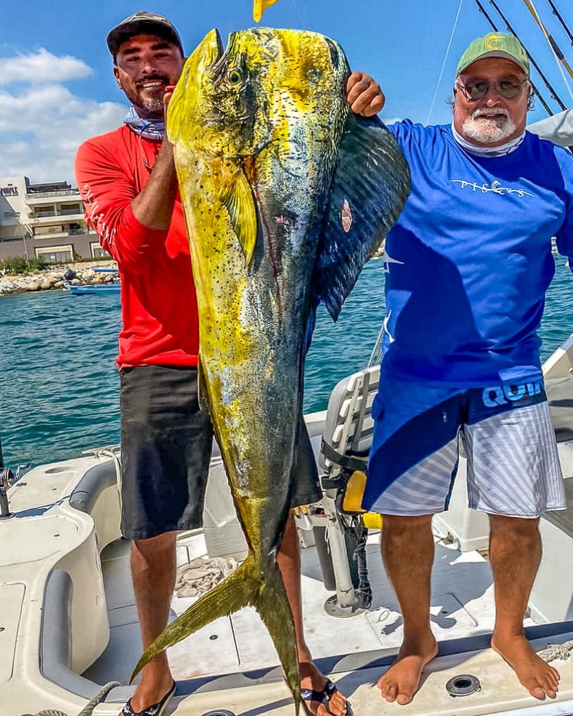 Angler and mate with 52-pound dorado